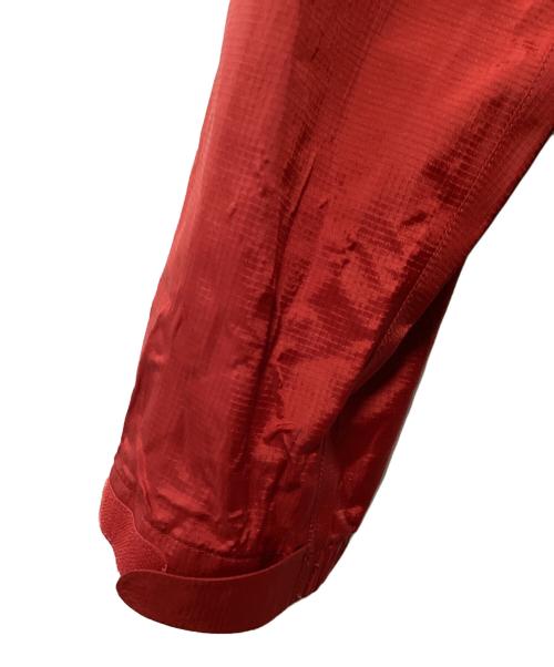 mont-bell（モンベル）mont-bell (モンベル) ナイロンジャケット レッド×ネイビー サイズ:Lの古着・服飾アイテム