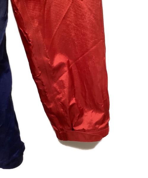 mont-bell（モンベル）mont-bell (モンベル) ナイロンジャケット レッド×ネイビー サイズ:Lの古着・服飾アイテム