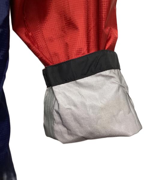 mont-bell（モンベル）mont-bell (モンベル) ナイロンジャケット レッド×ネイビー サイズ:Lの古着・服飾アイテム