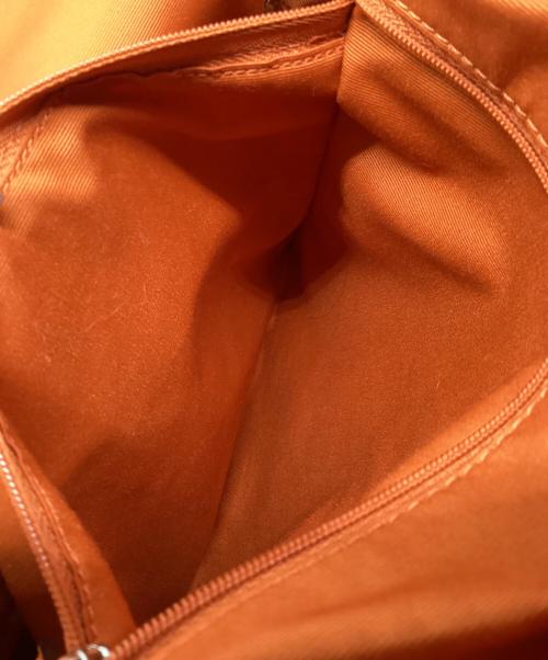 COACH（コーチ）COACH (コーチ) リュック ベージュ×オレンジの古着・服飾アイテム