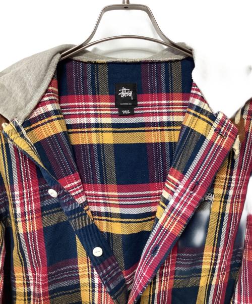 stussy（ステューシー）stussy (ステューシー) フード付ネルシャツ ネイビー×レッド サイズ:SMALLの古着・服飾アイテム