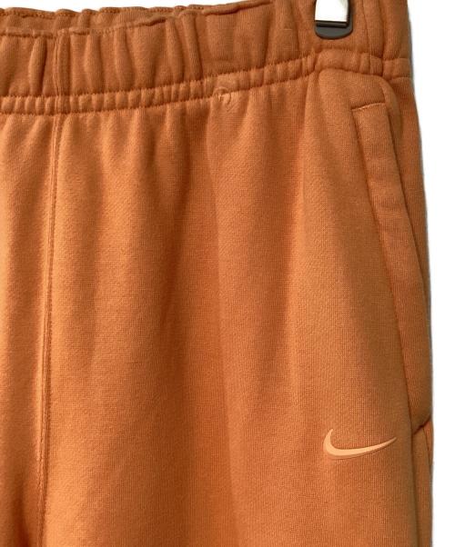 NIKE（ナイキ）NIKE (ナイキ) スウェットパンツ オレンジ サイズ:Mの古着・服飾アイテム