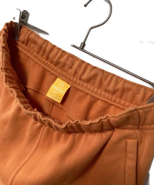 NIKE（ナイキ）NIKE (ナイキ) スウェットパンツ オレンジ サイズ:Mの古着・服飾アイテム