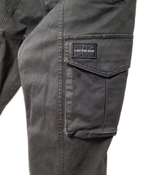 Calvin Klein Jeans（カルバンクラインジーンズ）Calvin Klein Jeans (カルバンクラインジーンズ) カーゴパンツ ブラック サイズ:Sの古着・服飾アイテム