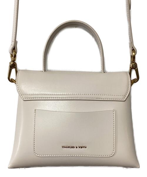 CHARLES & KEITH（チャールズアンドキース）CHARLES & KEITH (チャールズアンドキース) ストーンエンベリッシュド ハンドルバッグ アイボリーの古着・服飾アイテム
