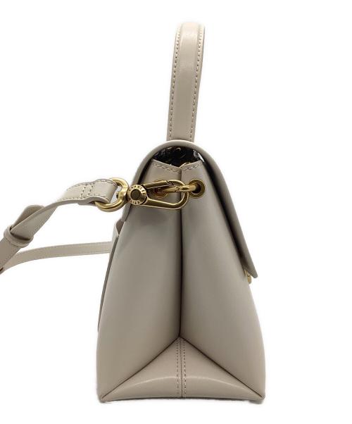 CHARLES & KEITH（チャールズアンドキース）CHARLES & KEITH (チャールズアンドキース) ストーンエンベリッシュド ハンドルバッグ アイボリーの古着・服飾アイテム