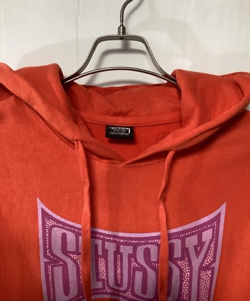 stussy（ステューシー）stussy (ステューシー) プルオーバーパーカー オレンジ サイズ:Mの古着・服飾アイテム