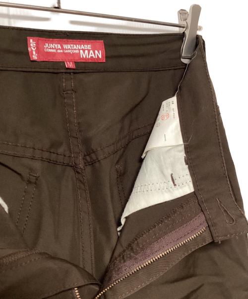 COMME des GARCONS JUNYA WATANABE MAN（コム デ ギャルソン ジュンヤ ワタナベ マン）COMME des GARCONS JUNYA WATANABE MAN (コム デ ギャルソン ジュンヤ ワタナベ マン) LEVI'S (リーバイス) パンツ ブラウン サイズ:Mの古着・服飾アイテム