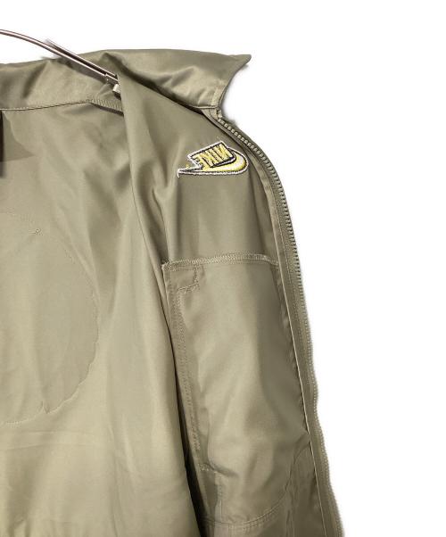 NIKE（ナイキ）NIKE (ナイキ) クラッシュ ロング SA ジャケット カーキ サイズ:XSの古着・服飾アイテム