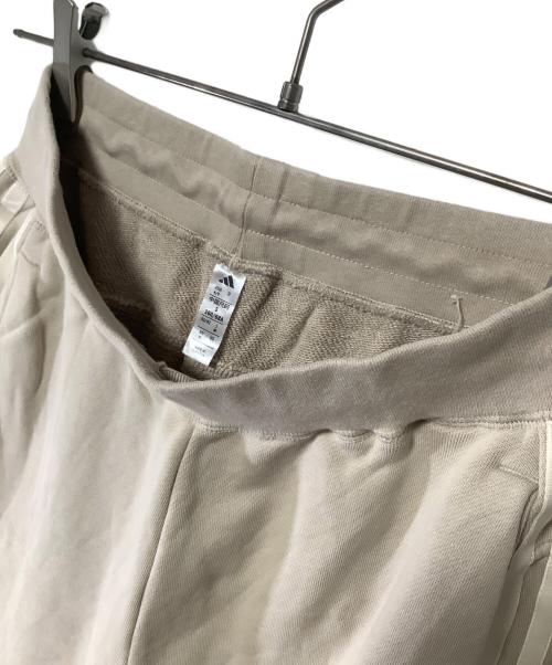 adidas（アディダス）adidas (アディダス) トラックパンツ ベージュ サイズ:Mの古着・服飾アイテム