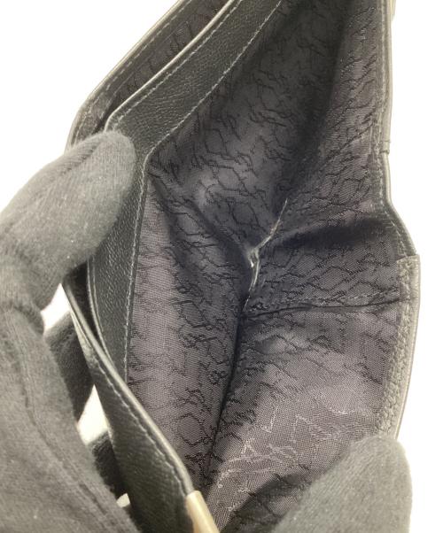 Yves Saint Laurent（イヴサンローラン）Yves Saint Laurent (イヴサンローラン) 2つ折り財布 ブラックの古着・服飾アイテム