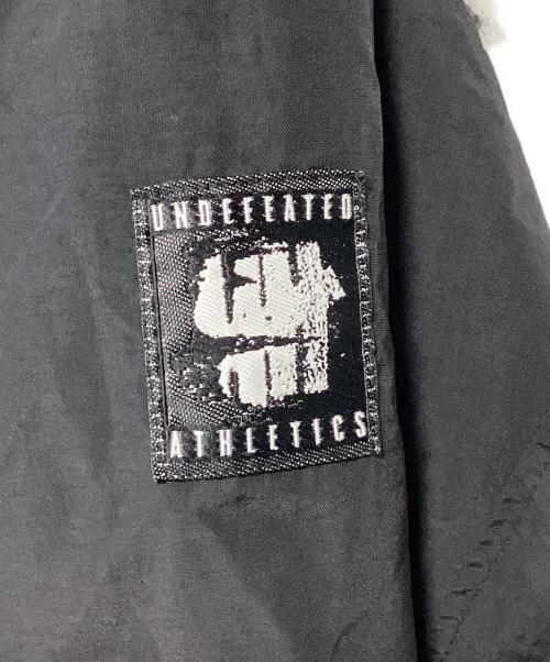 UNDEFEATED（アンディフィーテッド）UNDEFEATED (アンディフィーテッド) ナイロンジャケット ブラック サイズ:LARGEの古着・服飾アイテム