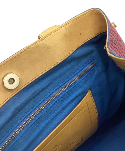Vivienne Westwood（ヴィヴィアンウエストウッド）Vivienne Westwood (ヴィヴィアンウエストウッド) ハンドバッグ レッド×イエローの古着・服飾アイテム