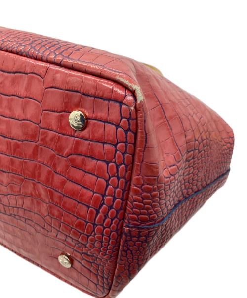 Vivienne Westwood（ヴィヴィアンウエストウッド）Vivienne Westwood (ヴィヴィアンウエストウッド) ハンドバッグ レッド×イエローの古着・服飾アイテム