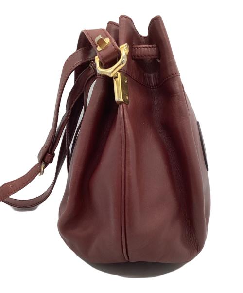 Cartier（カルティエ）Cartier (カルティエ) 巾着ショルダーバッグ レッドの古着・服飾アイテム