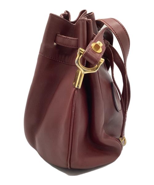 Cartier（カルティエ）Cartier (カルティエ) 巾着ショルダーバッグ レッドの古着・服飾アイテム
