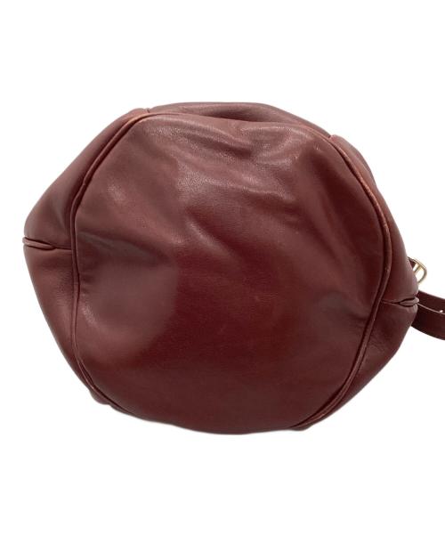 Cartier（カルティエ）Cartier (カルティエ) 巾着ショルダーバッグ レッドの古着・服飾アイテム