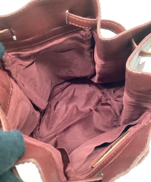 Cartier（カルティエ）Cartier (カルティエ) 巾着ショルダーバッグ レッドの古着・服飾アイテム