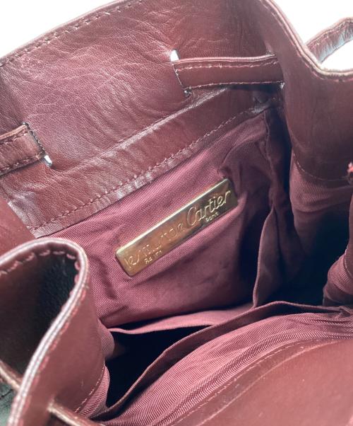 Cartier（カルティエ）Cartier (カルティエ) 巾着ショルダーバッグ レッドの古着・服飾アイテム