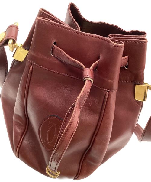 Cartier（カルティエ）Cartier (カルティエ) 巾着ショルダーバッグ レッドの古着・服飾アイテム