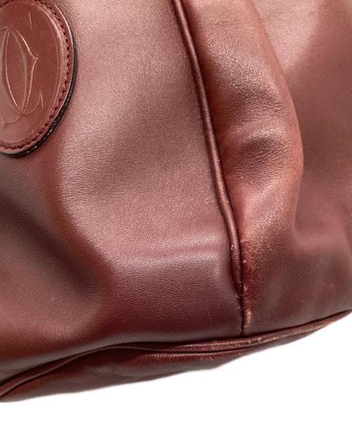 Cartier（カルティエ）Cartier (カルティエ) 巾着ショルダーバッグ レッドの古着・服飾アイテム