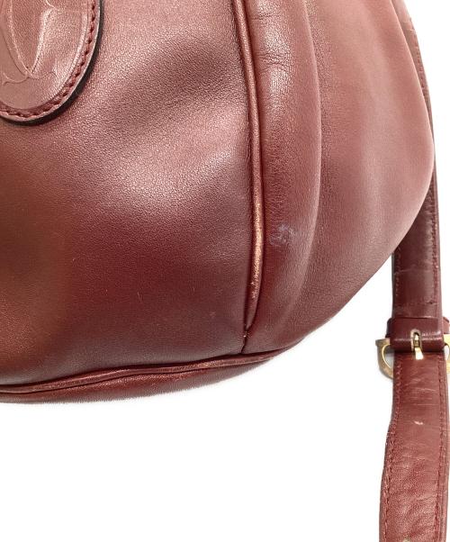 Cartier（カルティエ）Cartier (カルティエ) 巾着ショルダーバッグ レッドの古着・服飾アイテム