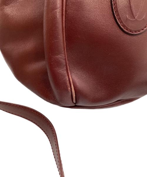Cartier（カルティエ）Cartier (カルティエ) 巾着ショルダーバッグ レッドの古着・服飾アイテム