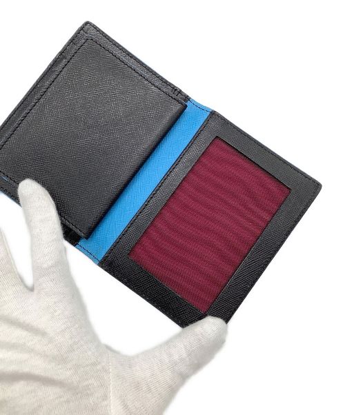 PAUL SMITH（ポールスミス）PAUL SMITH (ポールスミス) カードケース ブラック×ライトブルーの古着・服飾アイテム