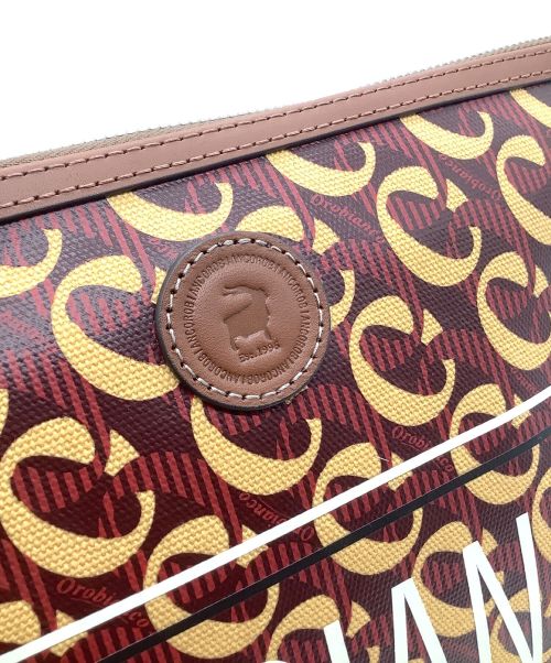 Orobianco（オロビアンコ）Orobianco (オロビアンコ) ヴァカンツァリム クラッチバッグの古着・服飾アイテム