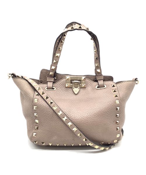 VALENTINO GARAVANI（ヴァレンティノ・ガラヴァーニ）VALENTINO GARAVANI (ヴァレンティノ・ガラヴァーニ) ロックスタッズ グレインカーフスキン ミニバッグ ピンクの古着・服飾アイテム