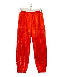 SUPREME（シュプリーム）の古着「Reflective Texe Track Pant 18AW」｜オレンジ