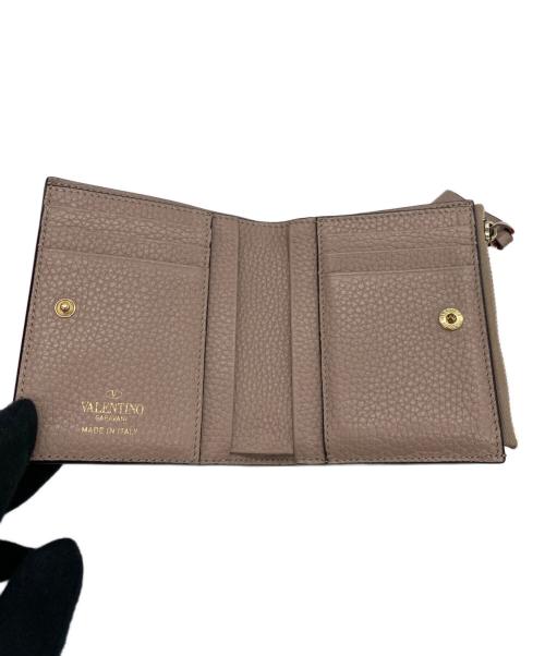 VALENTINO GARAVANI（ヴァレンティノ・ガラヴァーニ）VALENTINO GARAVANI (ヴァレンティノ・ガラヴァーニ) 2つ折り財布 ライトピンクの古着・服飾アイテム