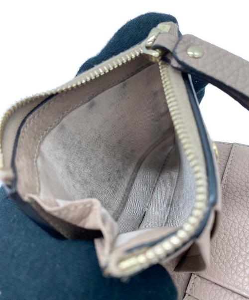 VALENTINO GARAVANI（ヴァレンティノ・ガラヴァーニ）VALENTINO GARAVANI (ヴァレンティノ・ガラヴァーニ) 2つ折り財布 ライトピンクの古着・服飾アイテム