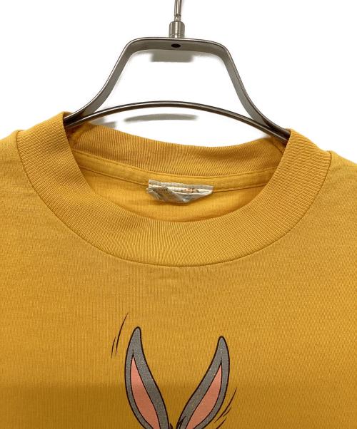 SPACE JAM（スペースジャム）SPACE JAM (スペースジャム) プリントTシャツ イエロー サイズ:Sの古着・服飾アイテム