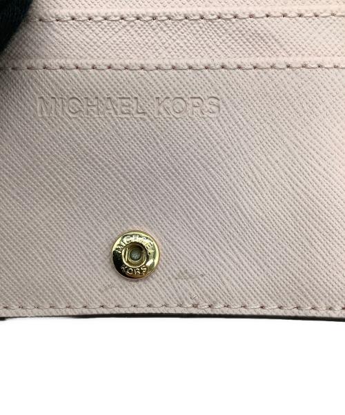 MICHAEL KORS（マイケル・コース）MICHAEL KORS (マイケルコース) 2つ折り財布 ピンクの古着・服飾アイテム