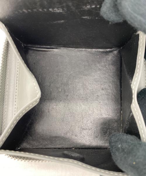 COMME des GARCONS（コムデギャルソン）COMME des GARCONS (コムデギャルソン) COMME des GARCONS（コムデギャルソン2つ折り財布 グレーの古着・服飾アイテム