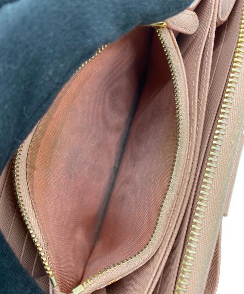 PRADA（プラダ）PRADA (プラダ) リボンラウンドファスナー財布 ピンクの古着・服飾アイテム