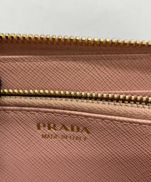 PRADA（プラダ）PRADA (プラダ) リボンラウンドファスナー財布 ピンクの古着・服飾アイテム