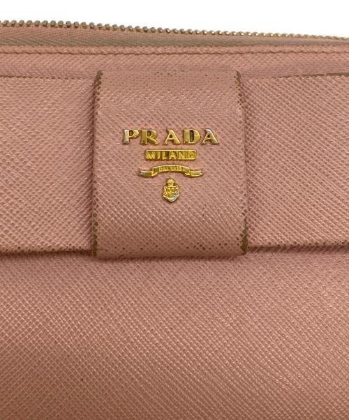 PRADA（プラダ）PRADA (プラダ) リボンラウンドファスナー財布 ピンクの古着・服飾アイテム