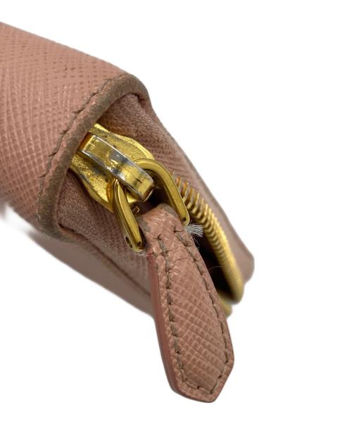 PRADA（プラダ）PRADA (プラダ) リボンラウンドファスナー財布 ピンクの古着・服飾アイテム