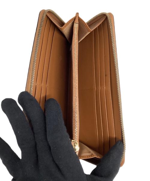 MCM（エムシーエム）MCM (エムシーエム) ラウンドファスナー財布 ブラウンの古着・服飾アイテム