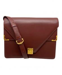 Cartier（カルティエ）の古着「ショルダーバッグ」｜ボルドー×ゴールド