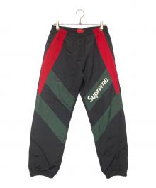 SUPREME（シュプリーム）の古着「Paneled Track Pant」｜ブラック×グリーン×レッド
