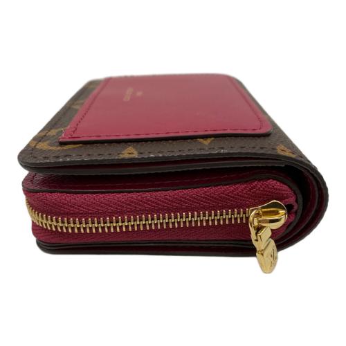 LOUIS VUITTON（ルイ ヴィトン）LOUIS VUITTON (ルイ ヴィトン) 2つ折り財布 ブラウンの古着・服飾アイテム