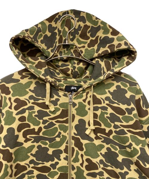 stussy（ステューシー）stussy (ステューシー) CAMO DOUBLE FACE ZIP HOODIE グリーン×ベージュ サイズ:XLの古着・服飾アイテム