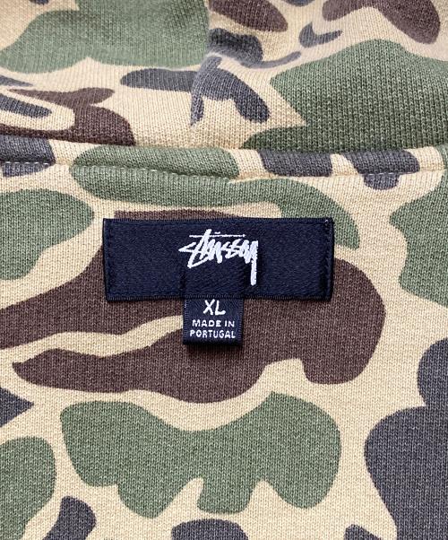 stussy（ステューシー）stussy (ステューシー) CAMO DOUBLE FACE ZIP HOODIE グリーン×ベージュ サイズ:XLの古着・服飾アイテム
