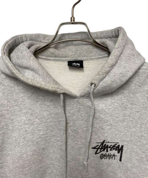 stussy（ステューシー）stussy (ステューシー) プルオーバーパーカー グレー サイズ:Mの古着・服飾アイテム