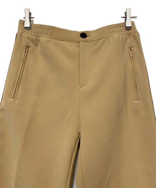 ANDERSSON BELL（アンダーソンベル）ANDERSSON BELL (アンダーソンベル) トラックパンツ ベージュ サイズ:Mの古着・服飾アイテム