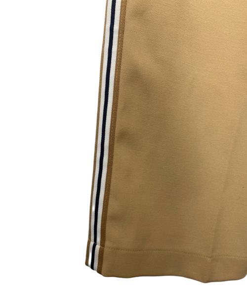 ANDERSSON BELL（アンダーソンベル）ANDERSSON BELL (アンダーソンベル) トラックパンツ ベージュ サイズ:Mの古着・服飾アイテム