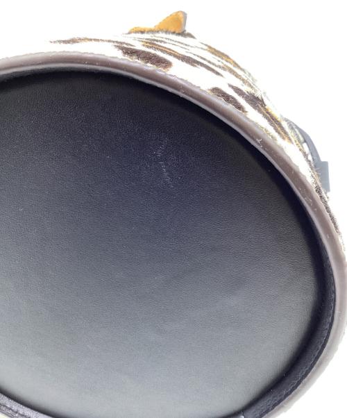 Kate Spade（ケイトスペード）Kate Spade (ケイトスペード) バターカップ レオパード ヘアカーフ スモールバケットバッグ ブラック×ホワイトの古着・服飾アイテム